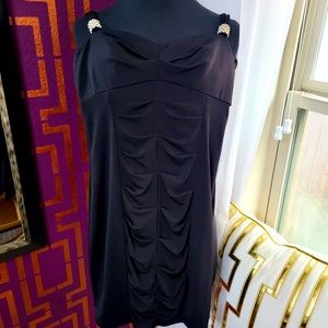 Black fitted dress with rhinestone strap detail